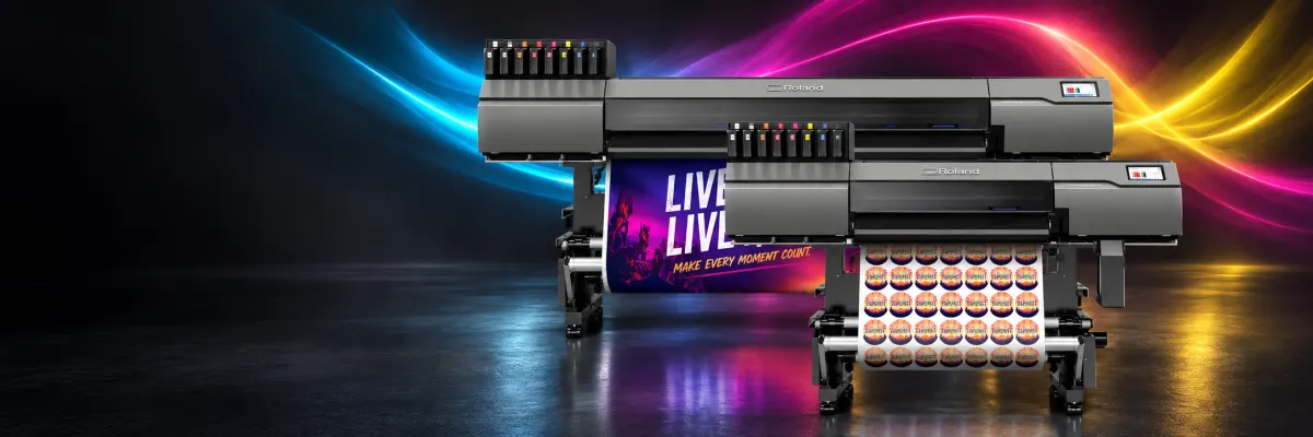 Two Roland TrueVIS MG2 printer cutters producing colourful graphics